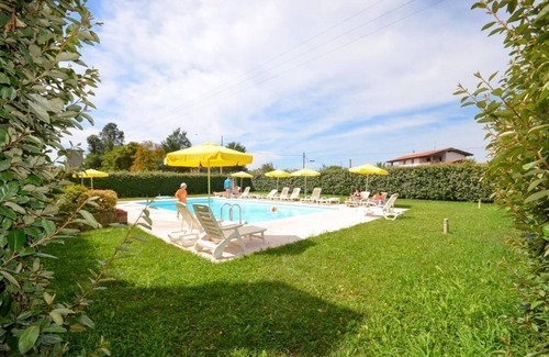 San Michele al Tagliamento Appartement | Escapade relaxante dans une oasis de verdure