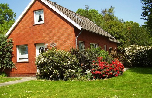Groß Holum Maison | Vacances relaxantes et plaisir en famille - maison de vacances avec jardin, WiFi et bien plus encore!