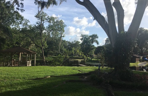 Lutz Maison | Relaxing waterfront haven. Near Moffett cancer center.