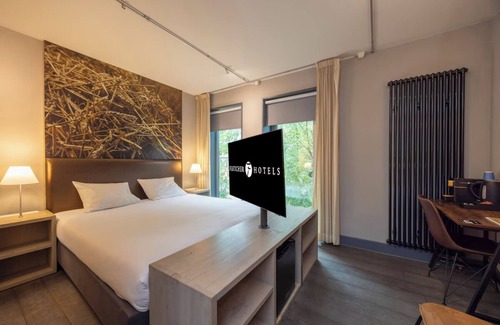 Coevorden Hôtel | Relish Modern Comforts in Historic Grain Warehouse Near Plopsa Indoor