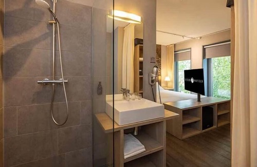 Coevorden Hôtel | Relish Modern Comforts in Historic Grain Warehouse Near Plopsa Indoor