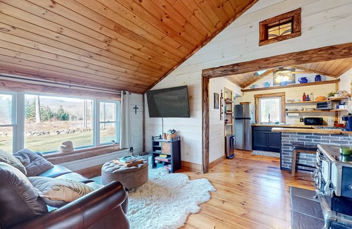 North Troy Cabine | Renovated historic cabin with mountain views, lake access, & electric fireplace