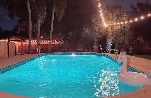 Forest City Maison | Resort-style home with a Heated Pool and a Huge Gated Yard