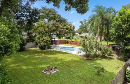 Forest City Maison | Resort-style home with a Heated Pool and a Huge Gated Yard