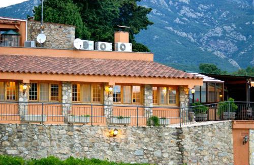Tapis Maison | Restaurante y Alojamiento Can Mach
