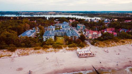 Niechorze Appartement | REZYDENCJA NIECHORZE Apart 123 ogrodzony ogródek przy plaży