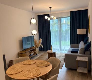 Niechorze Appartement | REZYDENCJA NIECHORZE Apart 123 ogrodzony ogródek przy plaży