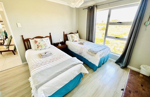 Stompneusbaai Appartement | Rienks Beach Nook - endroit le plus cosy de la côte ouest
