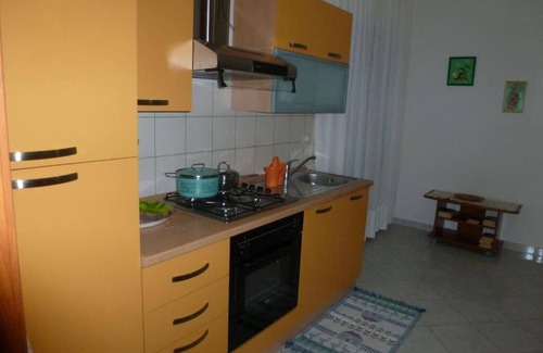 Iglesias Historic Centre Appartement | Rilassati nella Nostra Suite Rosa: Un Ambiente Familiare Vicino al Centro