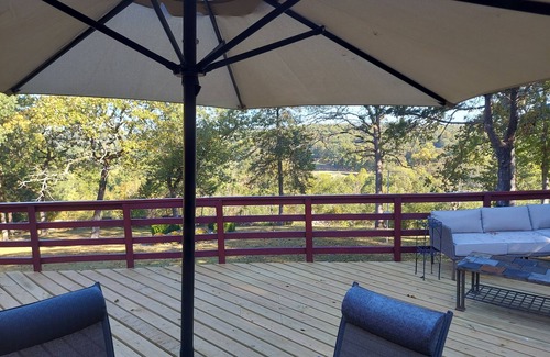 Cherokee Village Maison | Rock Inn Retreat: E Faye Jones style home. Rock walls in all bathrooms!