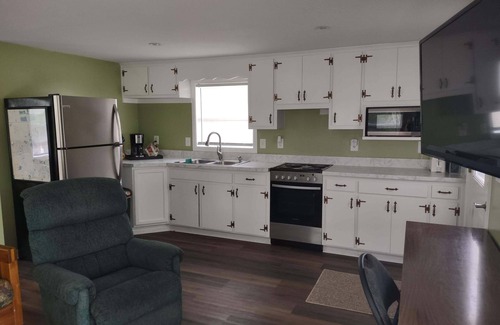 Dillard Estates Cottage | River front on the canal. Dock your boat at your deck porch.