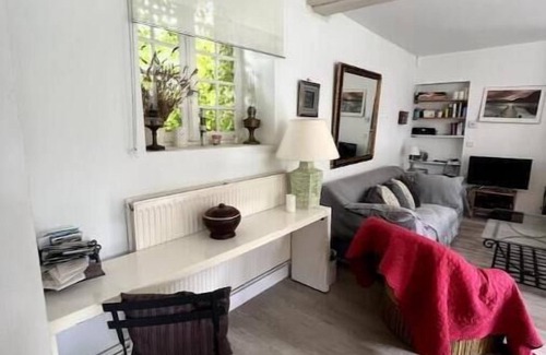 Aulnay-la-Riviere Maison | Riverfront pool and sauna house in a flower-filled park