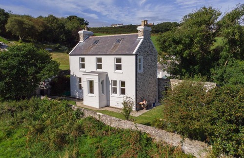 Cregneish Cottage | Riverside cottage is situated in a wonderful location near Port St Mary, Isle of Man. Nestled in a p