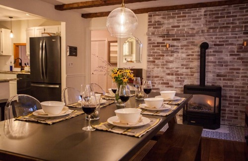 Webster Maison | Riverside Retreat w/ Hot Tub, Firepit, Gym, Sauna, & Dock – Near Lakes & Skiing
