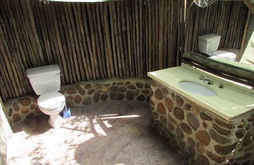 Thorny Bush Game Reserve Maison | Tapis de toile romantique sur la rivière, partagez une douche avec des singes et écoutez les lions