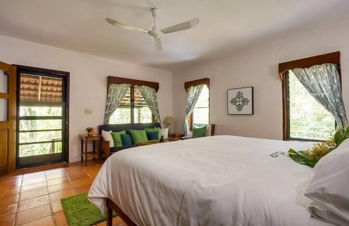 Negroman Station Balnéaire | Romantic Jungle Suite w/ Lush Tropical Views, Private Bath, and Air Conditioning