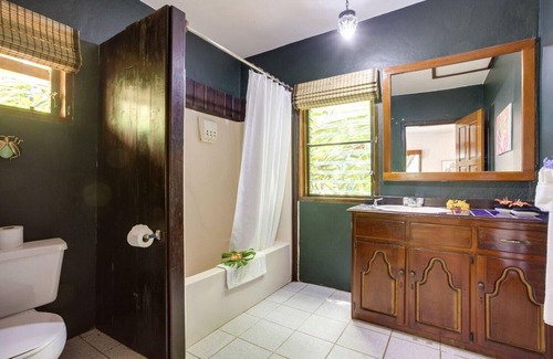 Negroman Station Balnéaire | Romantic Jungle Suite w/ Lush Tropical Views, Private Bath, and Air Conditioning
