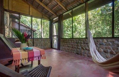 Negroman Station Balnéaire | Romantic Jungle Suite w/ Lush Tropical Views, Private Bath, and Air Conditioning