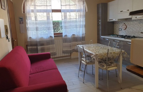 Sant'Andrea Appartement | Romantique appartement de deux pièces avec vue sur la campagne siennoise