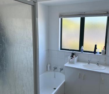 Papamoa Beach Maison | Room by the beach