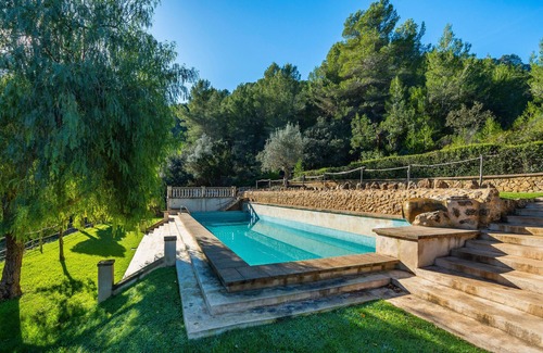 Puigpunyent Appartement | Chambre 'Habitación 2' avec vue sur les montagnes, piscine partagée et Wi-Fi
