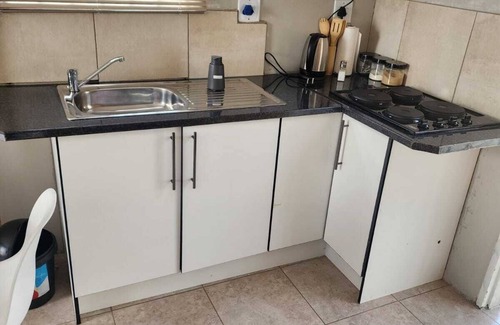 Govan Mbeki Maison | Room in B&B - Khutsong Apartmentss