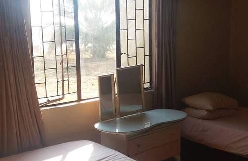 Lephalale Maison | Room in Guest Room - 3 Single Bedroom in Farmhouse in Limpopo Province