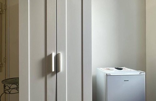 San Donato di Lecce Appartement | Chambre 'Palazzo Costantini - Girasole' avec Terrasse partagée, Wi-Fi et Climatisation