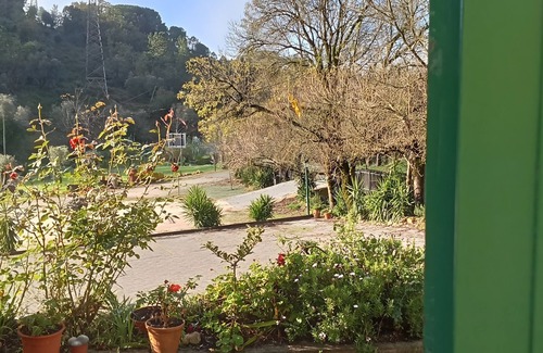 Coimbra Appartement | Chambre 'Quarto 4 Rc - Quinta Df' avec vue sur les montagnes, Wi-Fi et climatisation