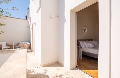 Sternatia Appartement | Chambre 'Relais Luxury Xenia - Suite' avec piscine partagée, Wi-Fi et climatisation
