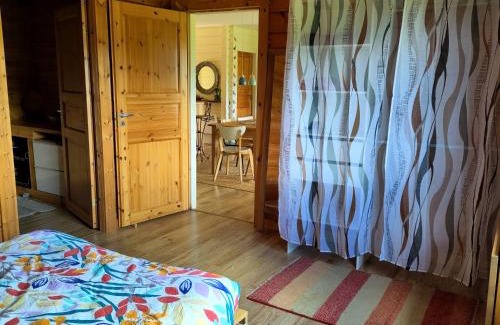 Rimont Maison | Room with en suite bathroom in cosy wooden house