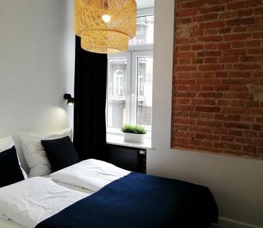 Srodmiescie Lit Et Petit-Déjeuner | Rooms by Apartamenty Lubartowska Street