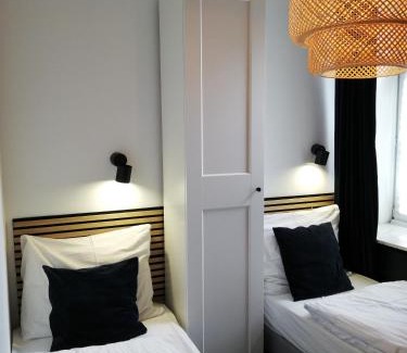 Srodmiescie Lit Et Petit-Déjeuner | Rooms by Apartamenty Lubartowska Street
