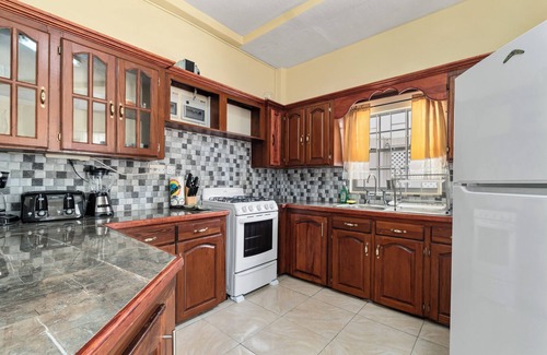 Morne Rouge Appartement | Roomy [1,001 sq ft] two bedroom Unit, steps away from white sand beach.