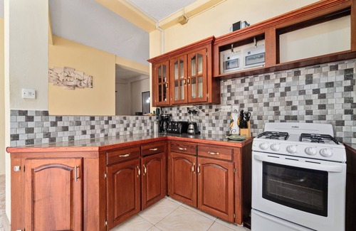 Morne Rouge Appartement | Roomy [1,001 sq ft] two bedroom Unit, steps away from white sand beach.