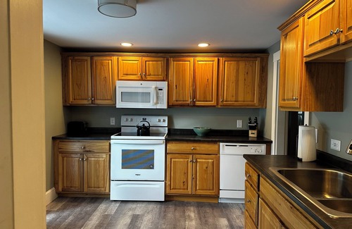 Sebago Maison | Roomy 3 bedroom with fireplace & wood-burning stove steps away from Sebago Lake