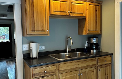 Sebago Maison | Roomy 3 bedroom with fireplace & wood-burning stove steps away from Sebago Lake