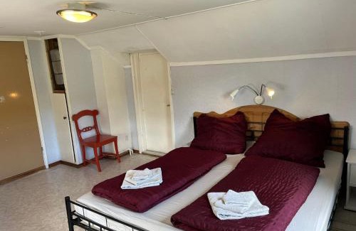 Lugnvik Maison | Rotes Schwedenhaus für Familien und Hunde