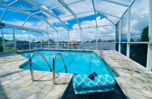 Eight Lakes Maison | Ruby's Lake Retreat - Heated Pool, Tiki Hut & Lake Views