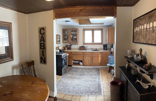 Evergreen Maison | Rustic and charming 2 bedroom retreat with a beautiful deck