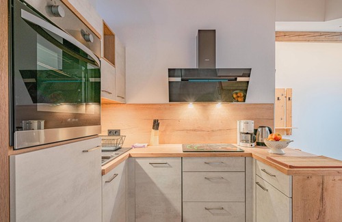 Hopfgarten Markt Appartement | Combinaison ferme-appartements vacances rustique