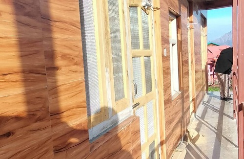 Chakrata Maison | Rustic Charm , Deodar Room with Mountain Vibes.