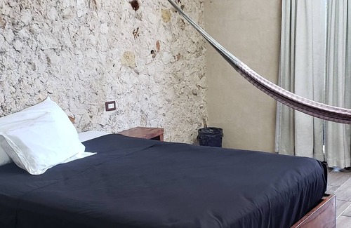 Chichen Itza - Valladolid Lit Et Petit-Déjeuner | Rustic charm in the heart of valladolid: with regional decoration and hammock