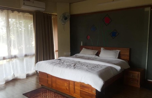 Kaimane Appartement | Rustic Charm Wayanad - The Roots (Treetop Suite)