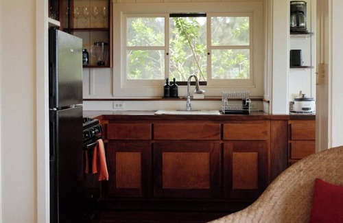 Kaunakakai Cottage | Rustic retreat with panoramic views, tropical gardens, & biodynamic produce!