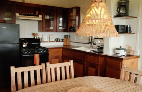 Kaunakakai Cottage | Rustic retreat with panoramic views, tropical gardens, & biodynamic produce!