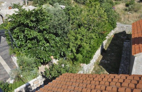 Lustica Villa | Maison en pierre rustique avec terrasse sur le toit et cour f. 4-6 personnes
