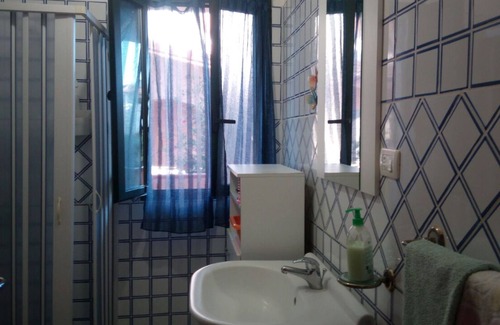 Piscinas Lit Et Petit-Déjeuner | Sa Domu Sarda - Appartement salle de jeux dans une villa mitoyenne avec entrée indépendante