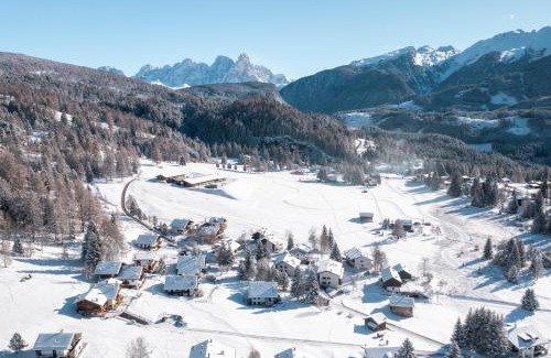 Bellamonte Appartement | Sa Mont Home - Moderno appartamento con parcheggio, sauna e deposito sci