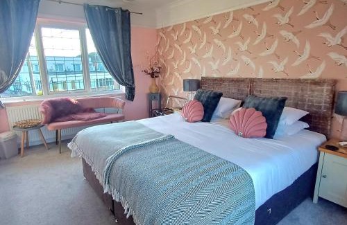 Wells-next-the-Sea Lit Et Petit-Déjeuner | Saltmarsh Rooms at Armeria in Wells next the Sea